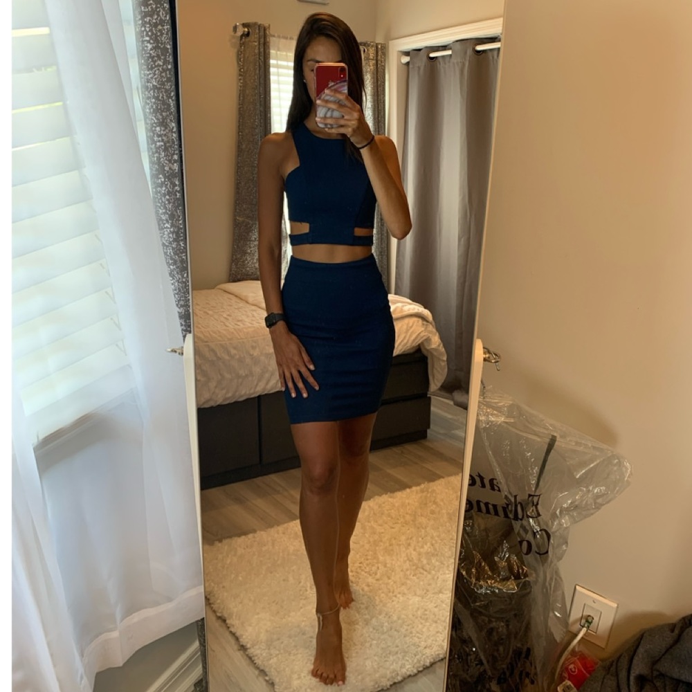 Two piece navy blue skirt set.